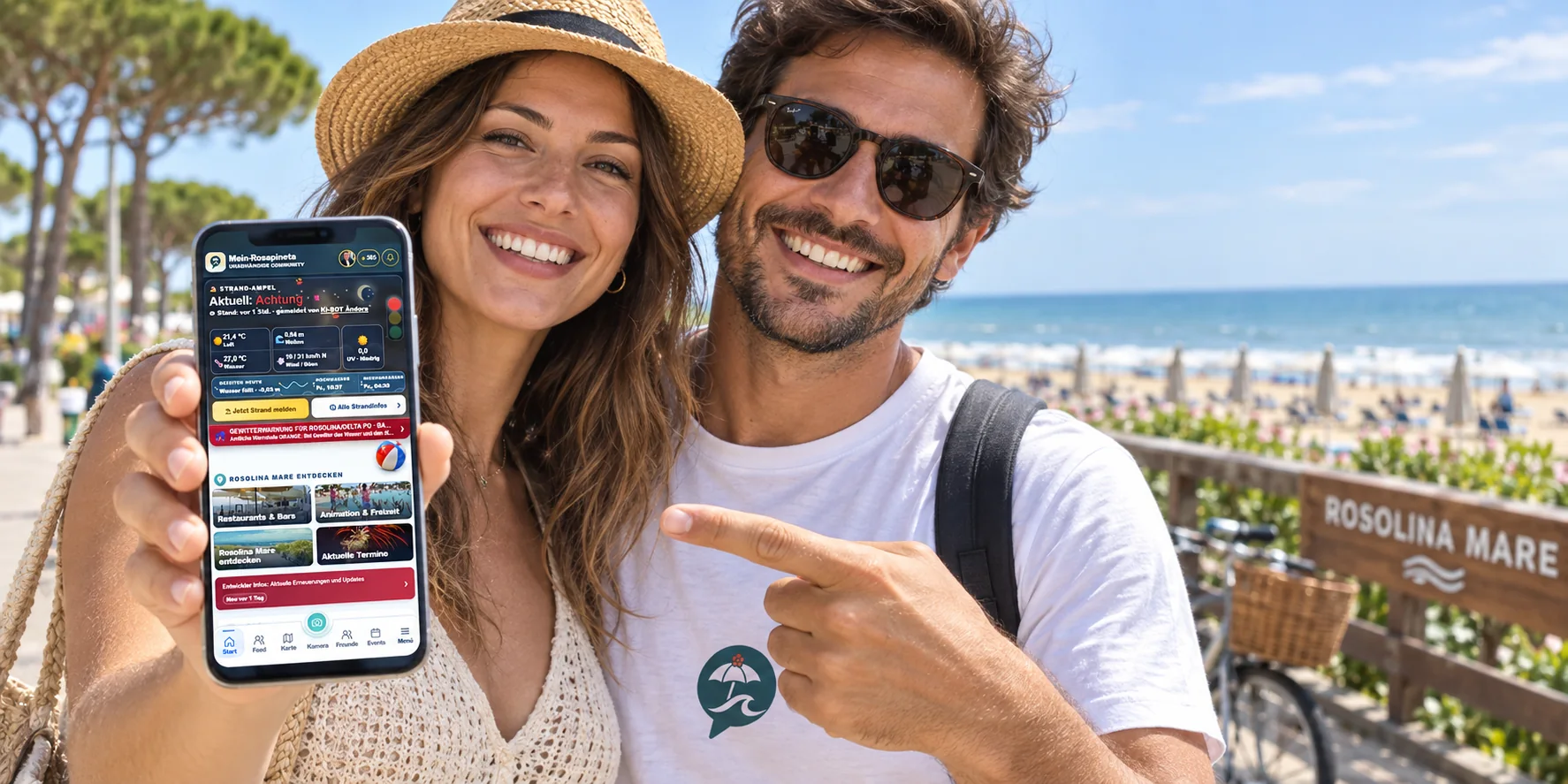 Two Rosolina Mare visitors showing the Mein-Rosapineta app on a smartphone